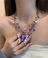 Collar de lazo con borla hueca y mariposa de circonita y cristal de acero inoxidable morado a la moda